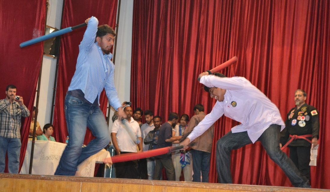 Two Spochan players in a double-sword duel at a demo in Hyderabad